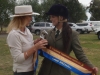 Renee Mason the over all winner receiving her Championship Sash and Trophy for the 3 Working Equitation phases presented by Gill Kennerley